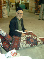Tying a carpet in Tabriz